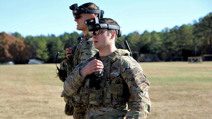 Soldiers don the Integrated Visual Augmentation System (IVAS) Capability Set 2 (CS 2) Heads Up Display (HUD) at Soldier Touchpoint 2 (STP 2) in November 2019 at Fort Pickett, Va.