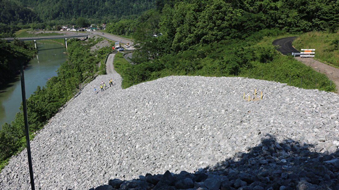 U.S. Army Corps of Engineers Nashville District officials check the completed repair of a slope above the Cumberland River diversion channel in Loyall, Kentucky during a site visit June 3, 2020. (USACE photo)
