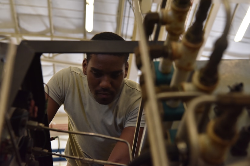 Airman 1st Class Samuel Turner, 437th Maintenance Squadron Aerospace Ground Equipment technician, inspects a self-generating nitrogen servicing cart at Joint Base Charleston, S.C., June 3, 2020. Members of the 437th MXS accept, fix and maintain equipment used on aircraft and in back shops to do maintenance inspections in order to keep the flight line a more lethal and ready force.