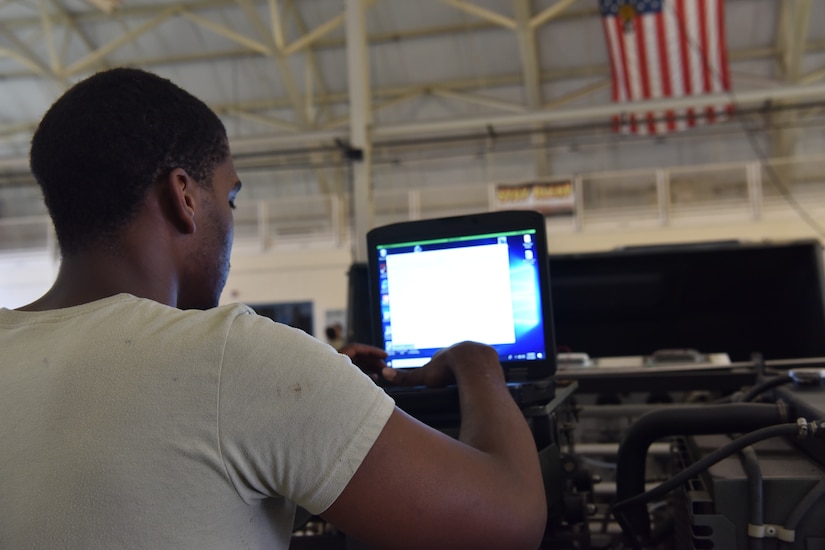 Airman 1st Class Samuel Turner, 437th Maintenance Squadron Aerospace Ground Equipment technician, looks at a schematic for a self-generating nitrogen servicing cart at Joint Base Charleston S.C., June 3, 2020. Members of the 437th MXS accept, fix and maintain equipment used on aircraft and in back shops to do maintenance inspections in order to keep the flight line a more lethal and ready force.