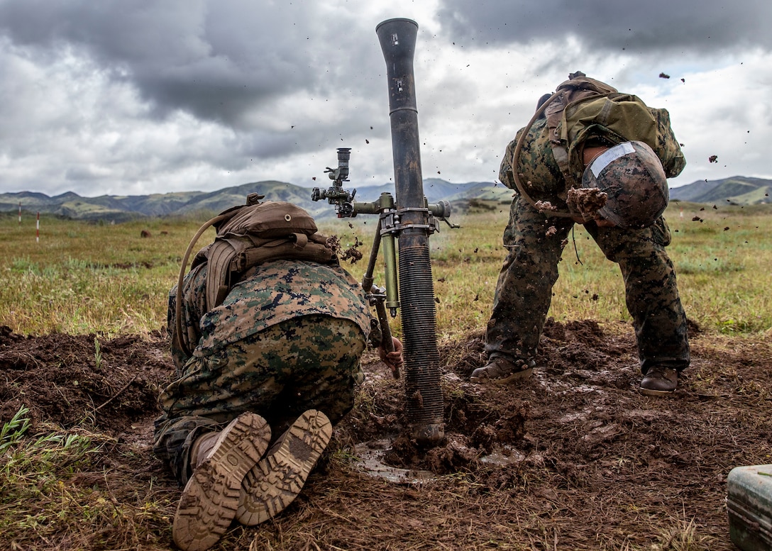 U.S. Marines fire an M252 81mm mortar system during a live-fire demonstration at Range 208C on Marine Corps Base Camp Pendleton, Calif., April 8.
