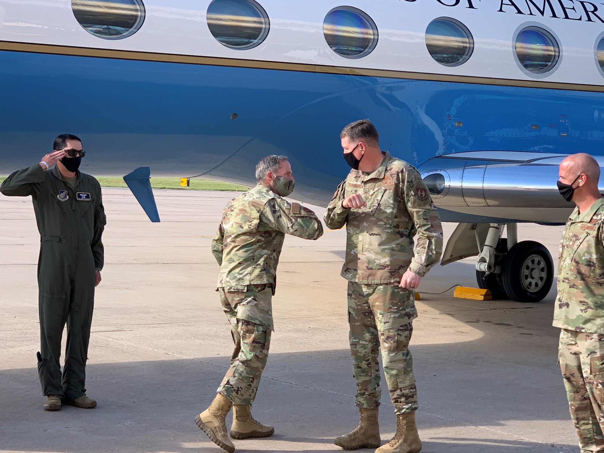 Lt. Gen. Gene Kirkland, Air Force Sustainment Center commander, right, greets Chief of Staff of the Air Force Gen. David L. Goldfein with an elbow bump upon his arrival at Tinker Air Force Base June 8.  Goldfein visited Tinker to observe firsthand the operational and financial impacts to sustainment due to COVID-19. (U.S. Air Force photo by Jonathan Stock)