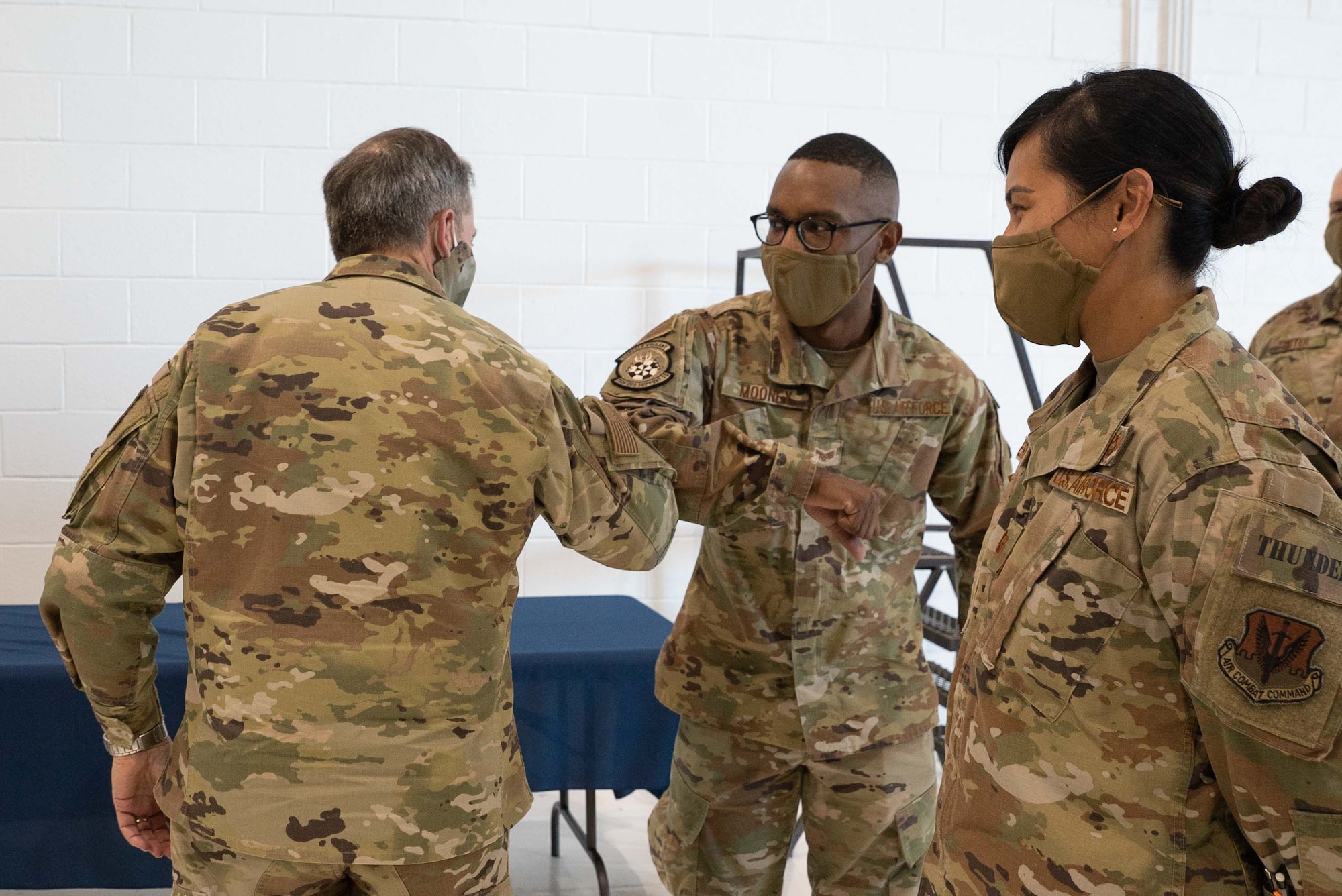 Gen. David L. Goldfein, Chief of Staff of the Air Force, congratulates Senior Airman Ervin Mooney, 752nd Operations Support Squadron, for achieving Senior Airman Below-the-Zone June 8 at Tinker Air Force Base. Mooney was also recognized for training 15 Airmen in a new Tactical Air Operations Module weapons system. (U.S. Air Force photo by 2nd. Lt. Danny Rangel)