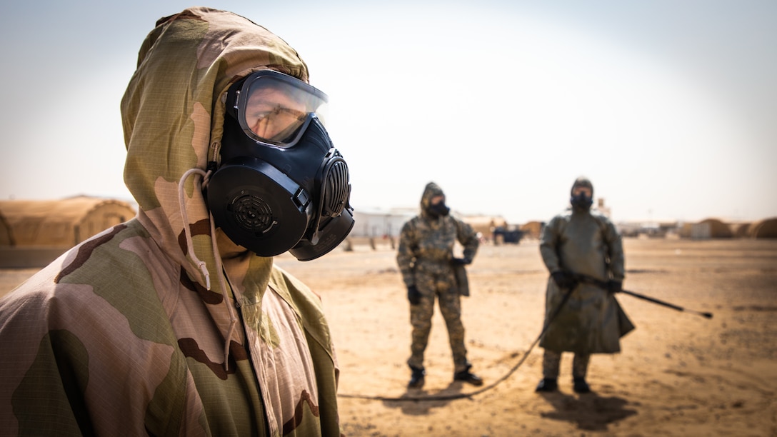 A U.S. Marine decontaminates a Mine Resistant Ambush Protected All-Terrain Vehicle during a Reconnaissance, Surveillance, and Decontamination Training Course in Kuwait, Apr. 22.