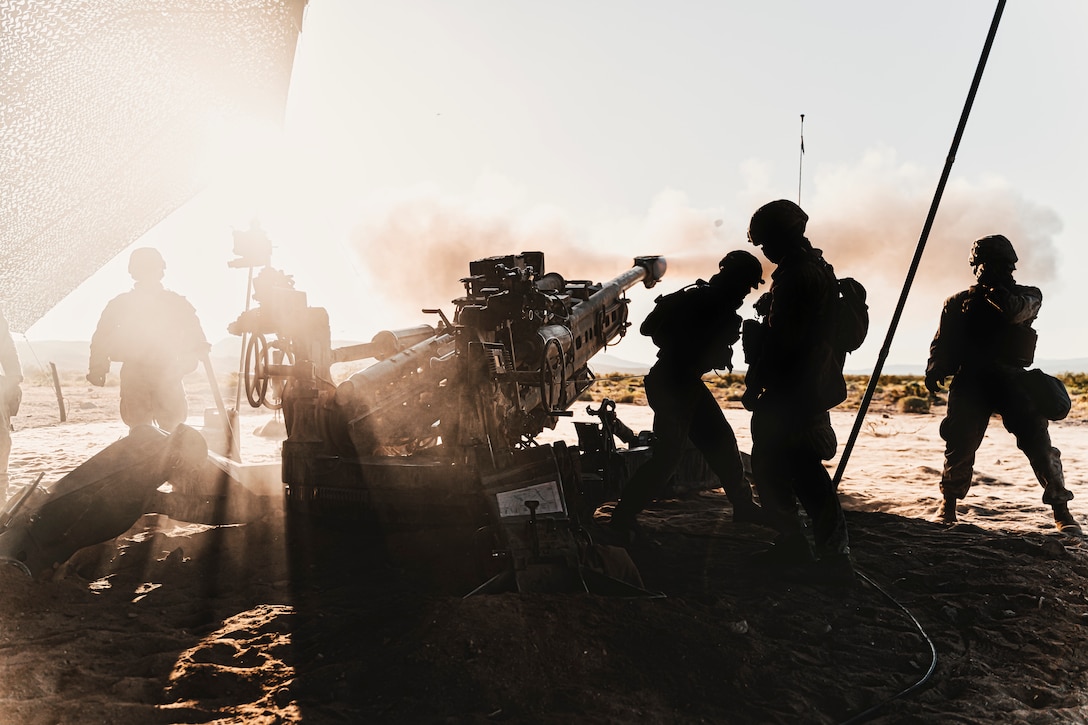 U.S. Marines fire an M777 Howitzer during a fire support and coordination exercise at Marine Corps Air Ground Combat Center, Twentynine Palms, Calif., April 23.