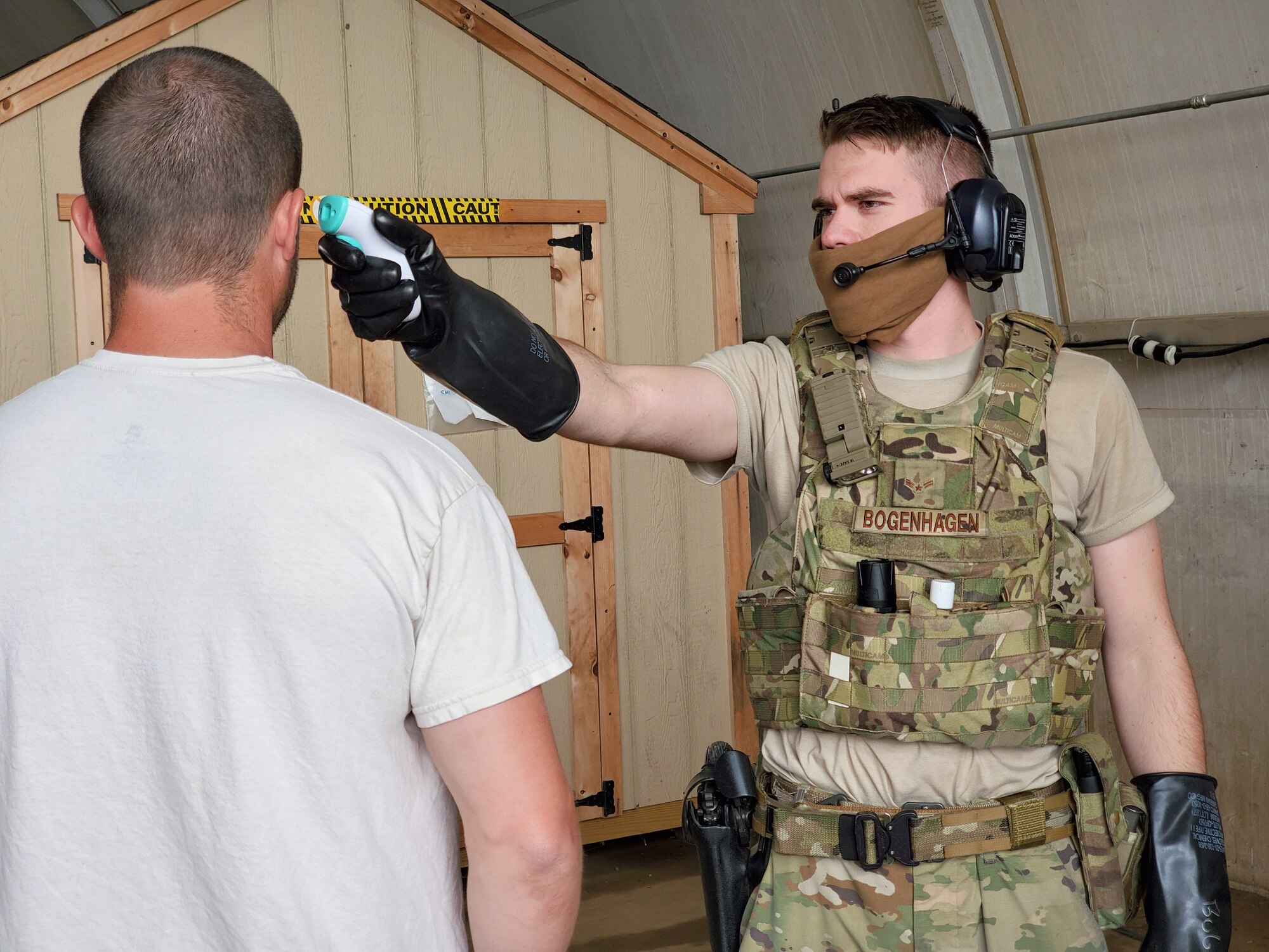 Airman 1st Class Jordan Bogenhagen of the 72nd Security Forces Squadron serves as a vehicle search area member at the Truck Gate.