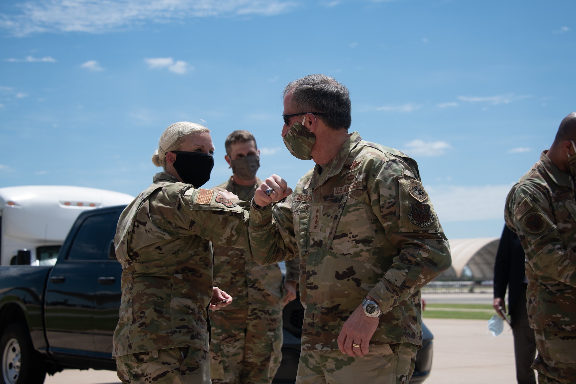 Air Force Chief of Staff Gen. David L. Goldfein bumps elbows with Capt. Audrey Mitchell, operations officer for the 137th Special Operations Logistics Readiness Squadron, during a base tour on June 8, 2020, at Will Rogers Air National Guard Base in Oklahoma City. The work of the 137th Special Operations Wing in support of intelligence, surveillance and reconnaissance missions has come across Goldfein's desk in recent months; and, in light of his upcoming visit, allowed the Wing to highlight its outstanding Airmen and highlight some of the most prominent features of the base that help execute the mission of the MC-12W.