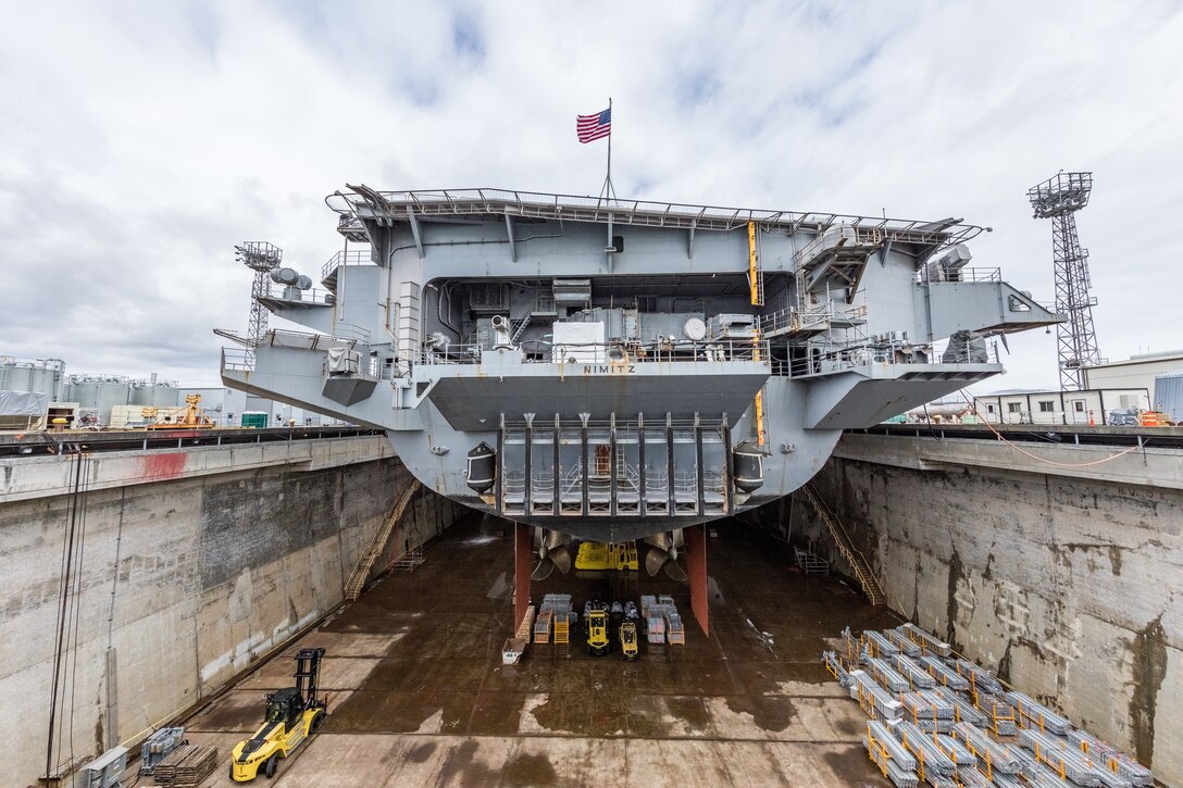 The aircraft carrier USS Nimitz (CVN 68) is seen in Dry Dock 6 after dewatering at Puget Sound Naval Shipyard & Intermediate Maintenance Facility in Bremerton, Wash., March 5, 2018.