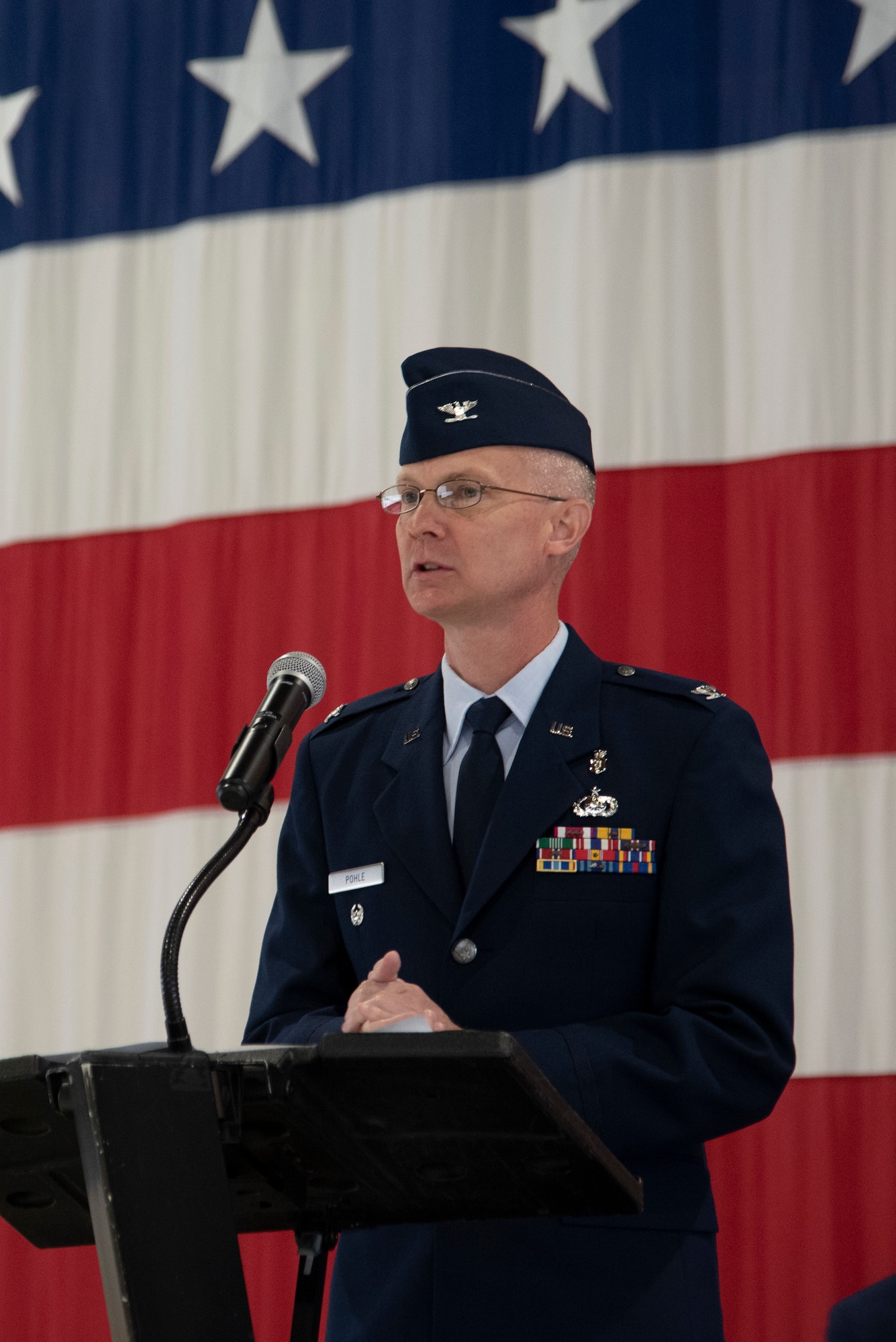 PETERSON AIR FORCE BASE, Colo. – Col. Patrick Pohle, 21st Medical Group commander, speaks during the group’s change of command ceremony, June 9, 2020 at Peterson Air Force Base, Colorado. Before Pohle took command of the 21st MDG, he was stationed at Joint Base San Antonio-Lackland, Texas, as the chief of Air Force Family Advocacy Program. Here, Pohle will be the senior medical advisor at the Space Force’s largest medical group with a team of more than 550 medical professionals. (U.S. Air Force photo by Staff Sgt. Alexandra M. Longfellow)