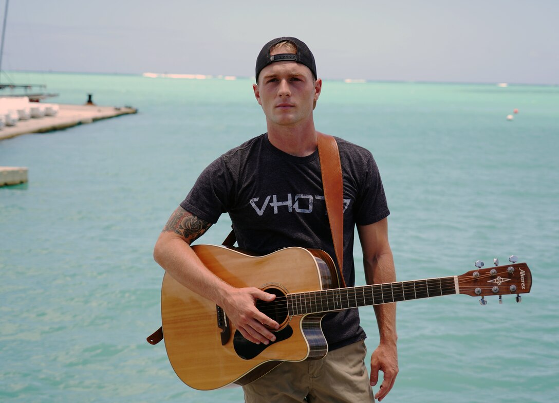 U.S. Air Force Staff Sgt. Derek Skelton, 25th Air Support Operations Squadron Tactical Air Control Party Airman, stands by the ocean on Joint Base Pearl Harbor-Hickam, Hawaii, June 5, 2020. TACP Airmen undergo extensive physical, mental, and technical training to ensure they can do their job well. (U.S. Air Force photo by Airman 1st Class Erin Baxter)