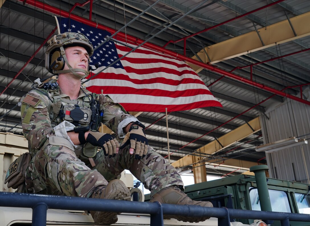 U.S. Air Force Staff Sgt. Derek Skelton, 25th Air Support Operations Squadron Tactical Air Control Party Airman, sits on a U.S. Army tactical vehicle on Wheeler Army Airfield, Hawaii, June 5, 2020. TACP Airmen are trained and responsible for ensuring airstrikes hit the right target downrange. (U.S. Air Force photo by Airman 1st Class Erin Baxter)