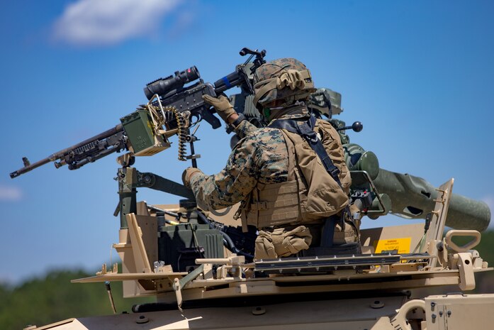 A U.S. Marine prepares to fire an M240B machine gun off a Joint Light Tactical Vehicle during a live-fire training event on Camp Lejeune, N.C., May 11.