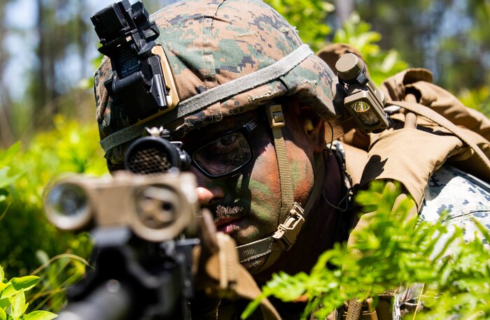 A U.S. Marine assaults an objective during a live-fire assault range at Camp Lejeune, N.C., May 5.