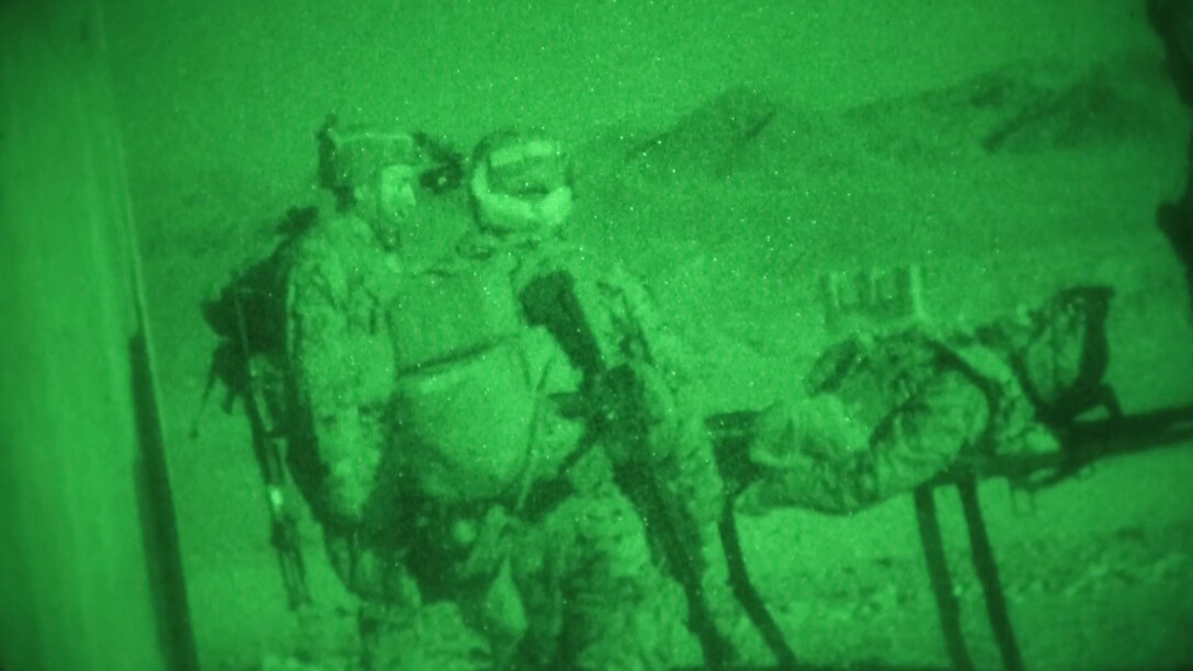 U.S. Marines with Charlie Company, Battalion Landing Team 1/4, 15th Marine Expeditionary Unit, carry a simulated causal to the casualty collection point for a long-range raid exercise during realistic urban training at Marine Air Ground Combat Center Twentynine Palms, California, June 05, 2020. Marines trained in an unfamiliar, urban environment, focusing on tactics, techniques and procedures applicable to raid operations. (U.S. Marine Corps photo by Cpl. Britany Rowlett)