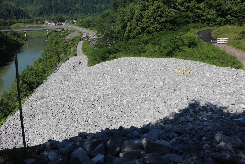 U.S. Army Corps of Engineers Nashville District officials check the completed repair of a slope above the Cumberland River diversion channel in Loyall, Kentucky during a site visit June 3, 2020. (USACE photo)