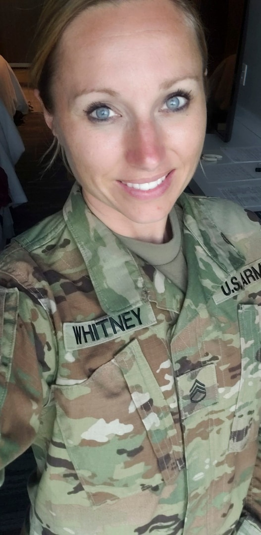 Staff Sgt. Christina Whitney, a medical instructor with the 426th Regional Training Institute shown on May 29, 2020, recently graduated from the University of Wisconsin Green Bay with a bachelor's degree in psychology. She is also supporting the state’s response to COVID-19 in Milwaukee.