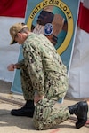 Norfolk Naval Shipyard Commander, Capt. Kai Torkelson, held a moment of silence at the “Unity at our C.O.R.E.” command event June 9, encouraging each person to reflect in their own way.  In an expression of solidarity, Torkelson took a knee in remembrance of George Floyd and in honor of all Black Americans.