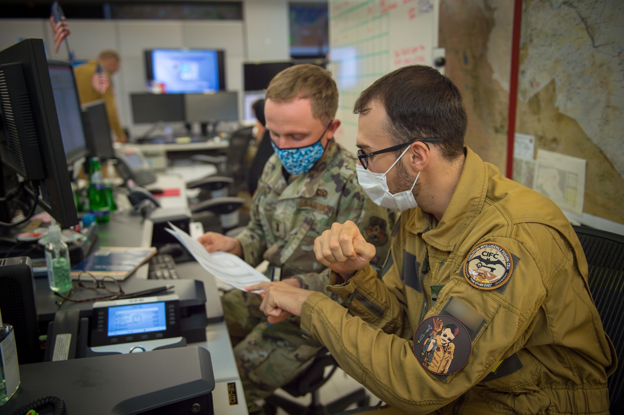 U.S. Air Force 2nd Lt. Kyle Hefner and French Naval Lt. j.g, Octave, targeeteers assigned to the Coalition Intelligence Fusion Cell, 609th Air Operations Center, U.S. Air Forces Central Command, Al Udeid Air Base, Qatar, collaborate daily to provide intelligence support. Targeeters are specially trained to analyze a target and develop solutions to support the commander’s objectives