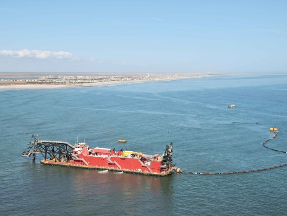 The Dredge Texas, owned and operated by Great Lakes Dredge & Dock Company, operates off of Stone Harbor in 2017 as part of periodic nourishment.