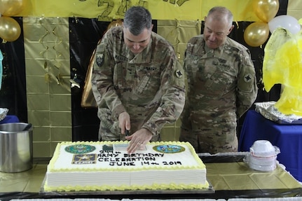 Officer cuts cake