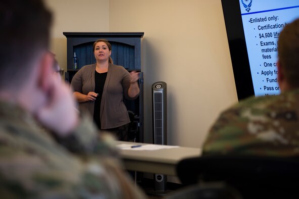 Lauren Clark, 50th Force Support Squadron education services specialist, briefs Airmen on education benefits service members available June 9, 2020, at Schriever Air Force Base, Colorado. While serving, Airmen have access to tuition assistance, which can pay for $4,500 of schooling from an accredited university each year. (U.S. Air Force photo by Airman 1st Class Jonathan Whitely)