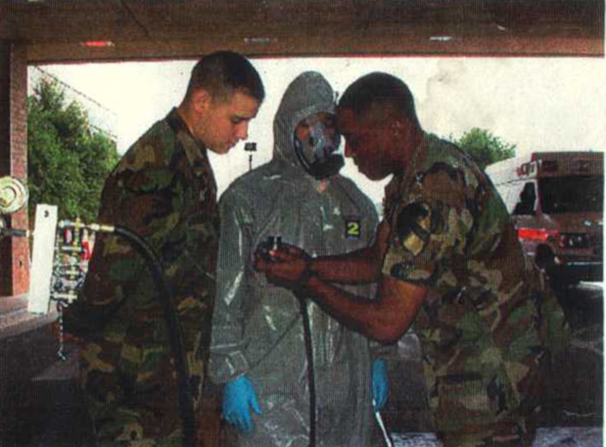 Then, Army Staff Sgt. Bernard Lawson working with a team of CBRN specialist to establish the first patient decontamination team at Brooke Army Medical Center on Fort Sam Houston, Texas, circa 2003. Lawson was at BAMC recovering from major nerve damage to his right side after a routine response call to VX gas at Johnston Atoll, a former chemical, weapons storage and demilitarization site. Through hard work and help from others, like Wounded Warriors, he continues to recover and is currently the emergency manager for the Air Force Installation and Mission Support Center. (U.S. Air Force courtesy photo)