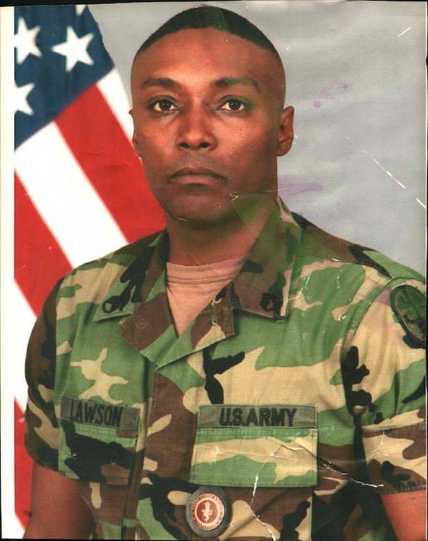 Then, Army Staff Sgt. Bernard Lawson's official photo as an instructor at the Army Medical Department on Fort Sam Houston, Texas, circa 2003. Lawson was recovering from major nerve damage at the Brooke Army Medical Center, when offered an opportunity to teach at AMEDD. Lawson is currently the emergency manager for the Air Force Installation and Mission Support Center. (U.S. Air Force courtesy photo)