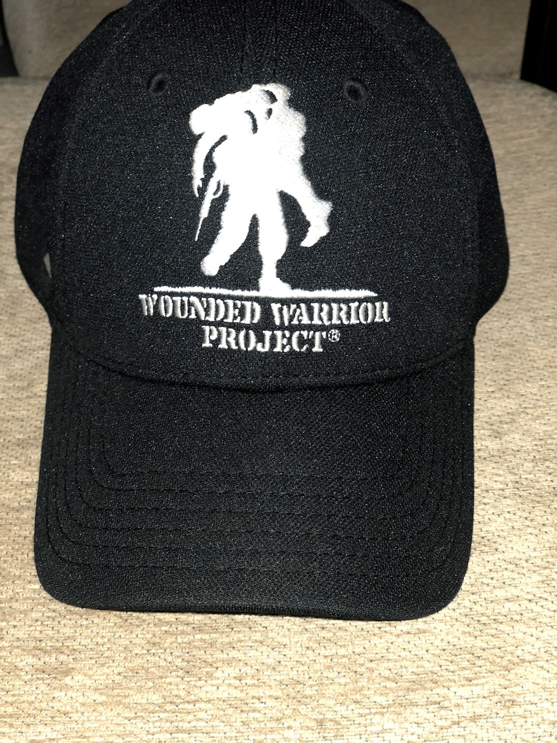 The Wounded Warrior hat given to Bernard Lawson by a good Samaritan at Brooke Army Medical Center on Fort Sam Houston, Texas, circa 2003. Lawson was at BAMC recovering from major nerve damage after a routine response call to VX gas at Johnston Atoll, a former chemical, weapons storage and demilitarization site. Through hard work and help from others, like Wounded Warriors, he continues to recover and is currently the emergency manager for the Air Force Installation and Mission Support Center. (U.S. Air Force courtesy photo)