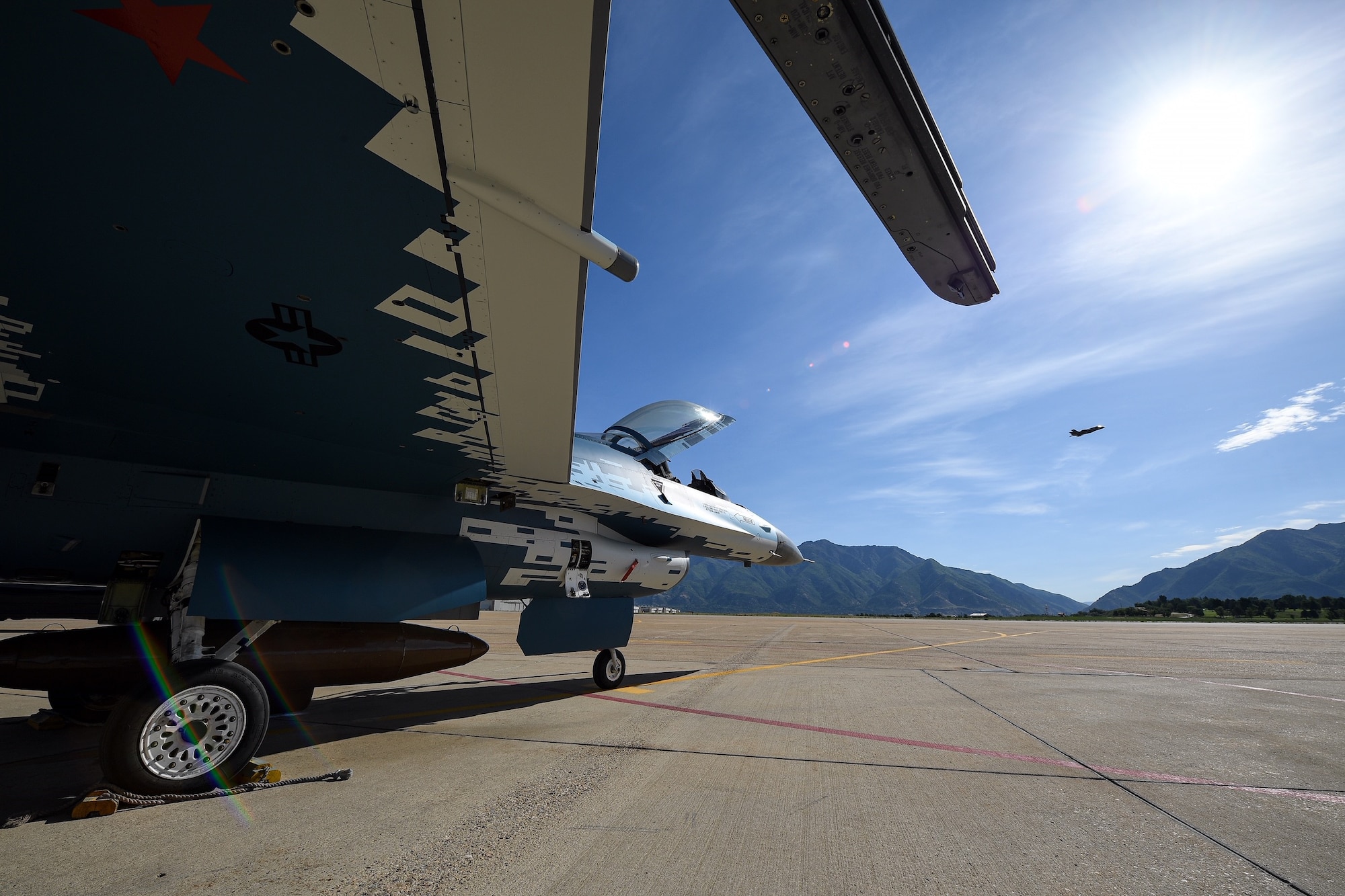 An F-16 Fighting Falcon with a "ghost" paint scheme sits on a ramp at Hill Air Force Base, Utah, June 3, 2020. (U.S. Air Force photo by R. Nial Bradshaw)