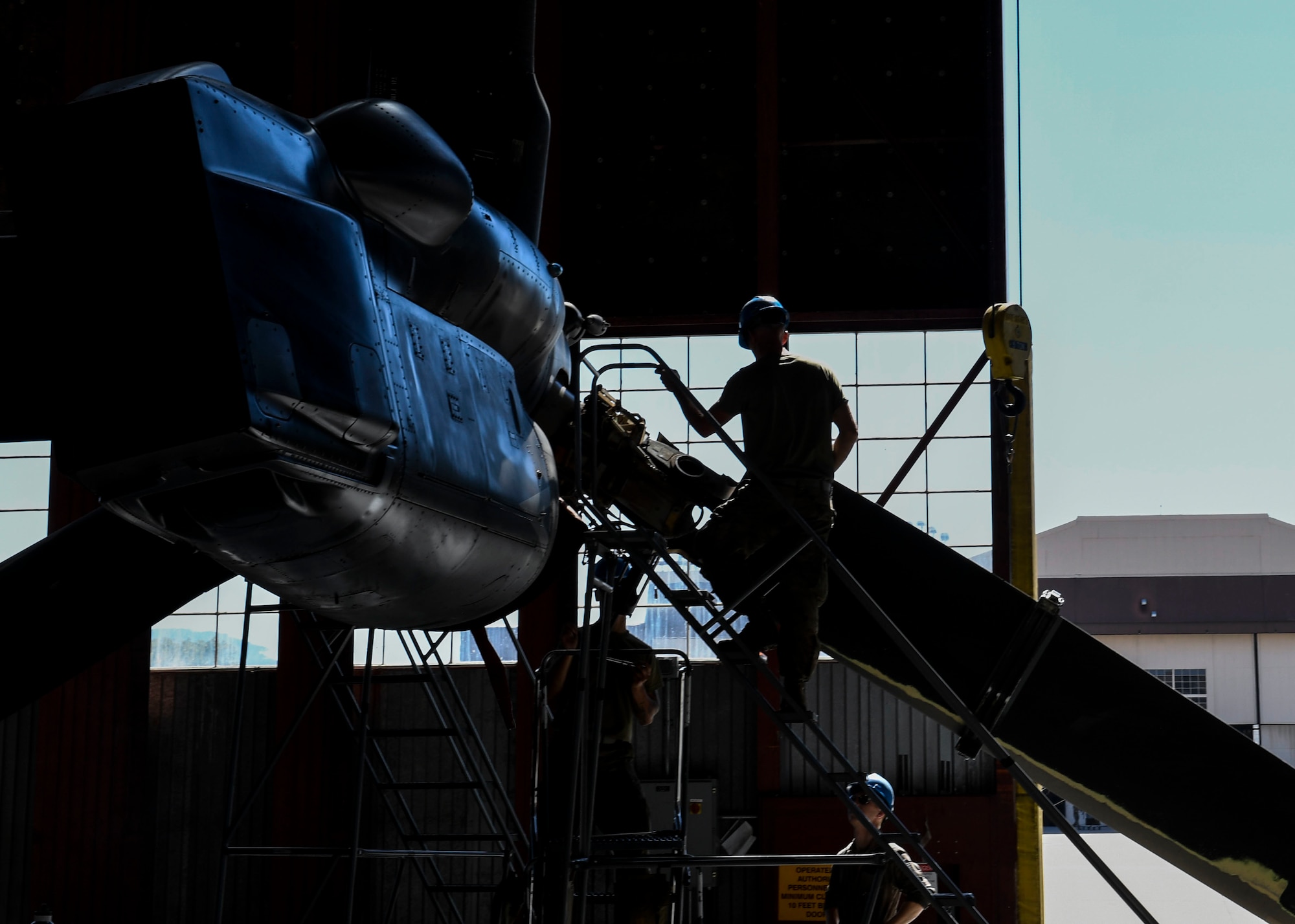 An Airmen works on an aircraft.