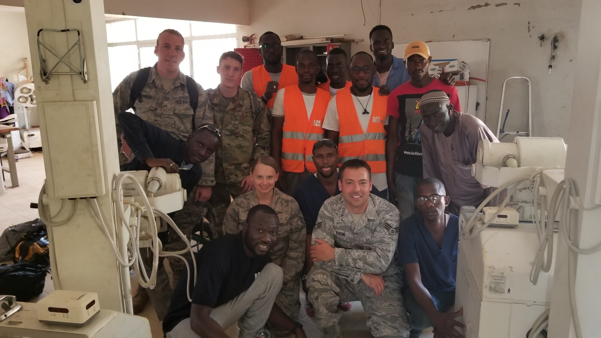 Staff Sgt. Matthew Lavigne, center, a biomedical equipment technician assigned to the 158th Medical Group, Vermont Air National Guard, was nominated and selected as the 2019 Air National Guard Medical Services Biomedical Equipment Repair Airman of the Year for his work with the State Partnership Program (SPP) during fiscal year 2019, Senegal, April 9, 2019. (Courtesy Photo)