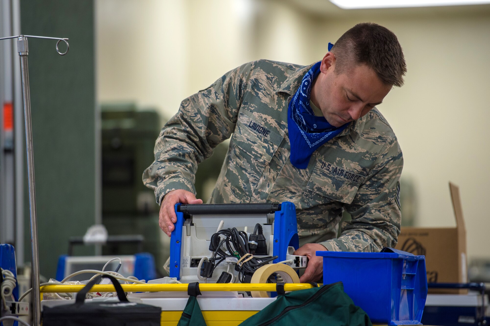 Staff Sgt. Matthew Lavigne, a biomedical equipment technician assigned to the 158th Medical Group, Vermont Air National Guard, inspects medical equipment at the Champlain Valley Exposition Alternate Healthcare Facility, Essex Junction, Vt., May 14, 2020. Lavigne was nominated and selected as the 2019 Air National Guard Medical Services Biomedical Equipment Repair Airman of the Year for this work with the State Partnership Program (SPP) during fiscal year 2019. (U.S. Air National Guard photo by Senior Master Sgt. Michael Davis)
