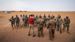 Air Force air advisors assigned to the 409th Expeditionary Security Forces Squadron brief the Niger Armed Forces (FAN) before training exercises in Agadez, Niger, July 10, 2019. The FAN learned how to efficiently and safely clear a building. (U.S. Air Force photo by Staff Sgt. Devin Boyer)