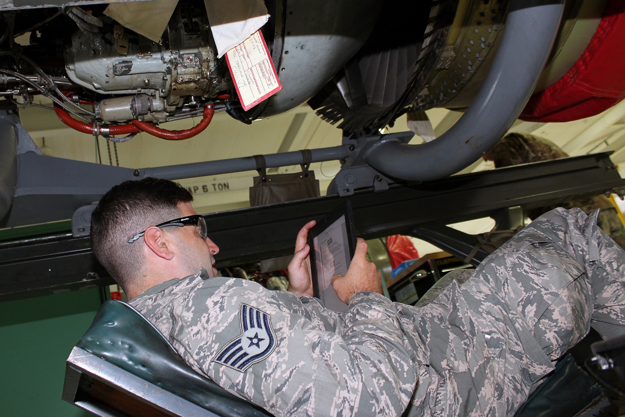 Staff Sgt. Andrew Kolbe reviews a technical order for a T34 engine at Selfridge Air National Guard Base, Mich., June 6, 2020. The T34 is used on the A-10 Thunderbolt II aircraft assigned to Selfridge. Kolbe was receiving upgrade training as a jet propulsion specialist with the 127th Maintenance Group. (U.S. Air National Guard photo by Tech. Sgt. Dan Heaton)