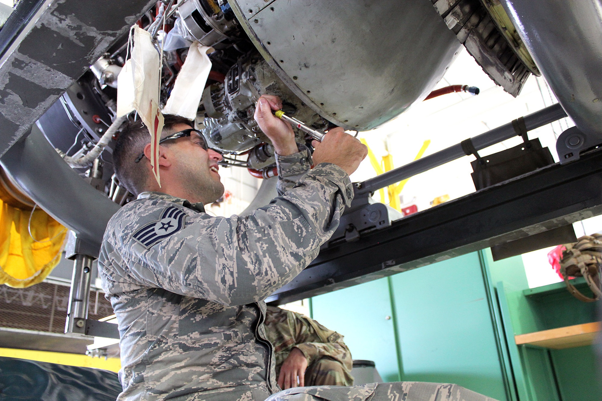 Staff Sgt. Andrew Kolbe works on a T34 engine at Selfridge Air National Guard Base, Mich., June 6, 2020. The T34 is used on the A-10 Thunderbolt II aircraft assigned to Selfridge. Kolbe was receiving upgrade training as a jet propulsion specialist with the 127th Maintenance Group. (U.S. Air National Guard photo by Tech. Sgt. Dan Heaton)