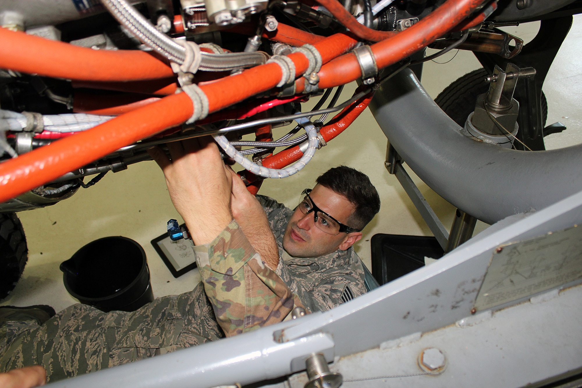 Staff Sgt. Andrew Kolbe works on a T34 engine at Selfridge Air National Guard Base, Mich., June 6, 2020. The T34 is used on the A-10 Thunderbolt II aircraft assigned to Selfridge. Kolbe was receiving upgrade training as a jet propulsion specialist with the 127th Maintenance Group. (U.S. Air National Guard photo by Tech. Sgt. Dan Heaton)
