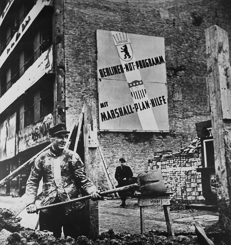 Marshall Plan aid to Germany enabled that country to rise from the ashes of defeat, as symbolized by this worker in West Berlin. (U.S. National Archives)