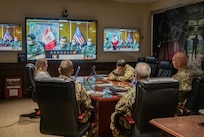 Leadership of the West Virginia National Guard (WVNG) held a video conference call with their State Partnership Program (SPP) counterparts in Perú to discuss COVID-19 military response efforts and best practices June 11, 2020. Maj. Gen. James Hoyer, Adjutant General of the WVNG, and Command Sgt. Maj. Phillip Cantrell, senior enlisted advisor for the WVNG, along with an interpreter, and SPP-Peru program coordinator, Sgt. 1st Class Hector Guillen, spent an hour discussing COVID-19 efforts with their Peruvian counterparts, including Brig. Gen. Marcos Rodriguez, the commander of the Peruvian Army’s National Support and Development Command. (U.S. Army National Guard photo by Edwin L. Wriston)