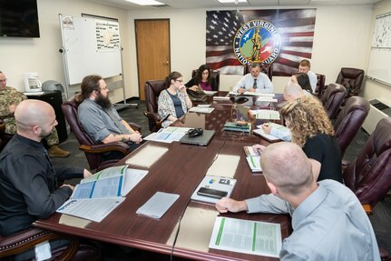 Participants from multiple state and federal agencies take part in a Cybersecurity Tabletop Exercise (TTX) dealing with election security, June 19, 2019, hosted at the West Virginia National Guard (WVNG) Joint Forces Headquarters (JFHQ) in Charleston, W.Va. The exercise was held to identify best practices and areas for improvement in cyber incident planning, identification, response, and recovery for elections.