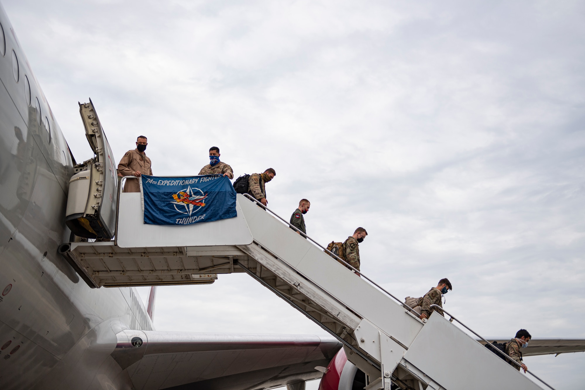A photo of Airmen deplaning