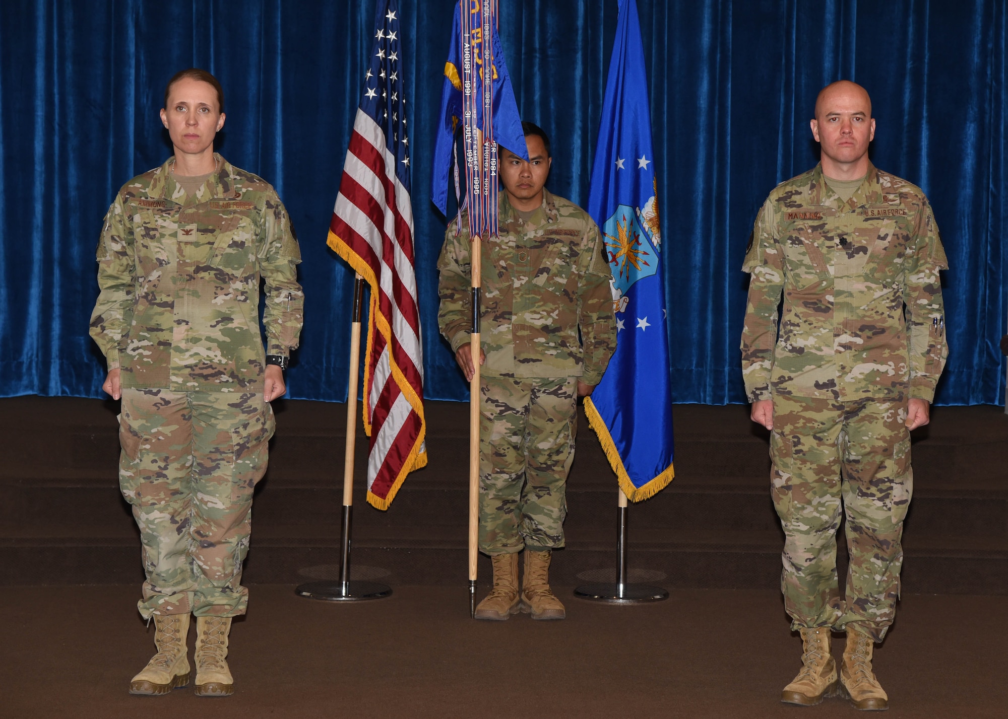 Lieutenant Colonel Joseph Manning, 90th Communications Squadron commander, stands ready to be charged with command of the 90th CS, during the 90 CS assumption of command ceremony June 8, 2020 at Trail’s End on F.E. Warren Air Force Base, Wyo. As a measure to prevent spread of the coronavirus, a salute is rendered in lieu of the passing of the guidon. (U.S. Air Force Photo by Senior Airman Braydon Williams)