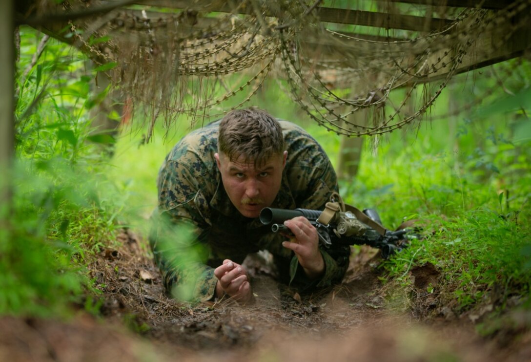 U.S. Marine Corps Lance Cpl. Charles Megown, a rifleman with 2d Light Armored Reconnaissance Battalion (LAR) participates in an endurance course during the Isaak Competition at Camp Geiger, North Carolina, June 8, 2020. 2d LAR hosts the annual competition to honor Cpl. Garreth Isaak, a LAR Marine who earned the Silver Star during Operation Just Cause. It aims to develop the unit’s combat fitness, proficiency, readiness, and recognize the most proficient scout within the Battalion. (U.S. Marine Corps photo by Cpl. Alize Sotelo)