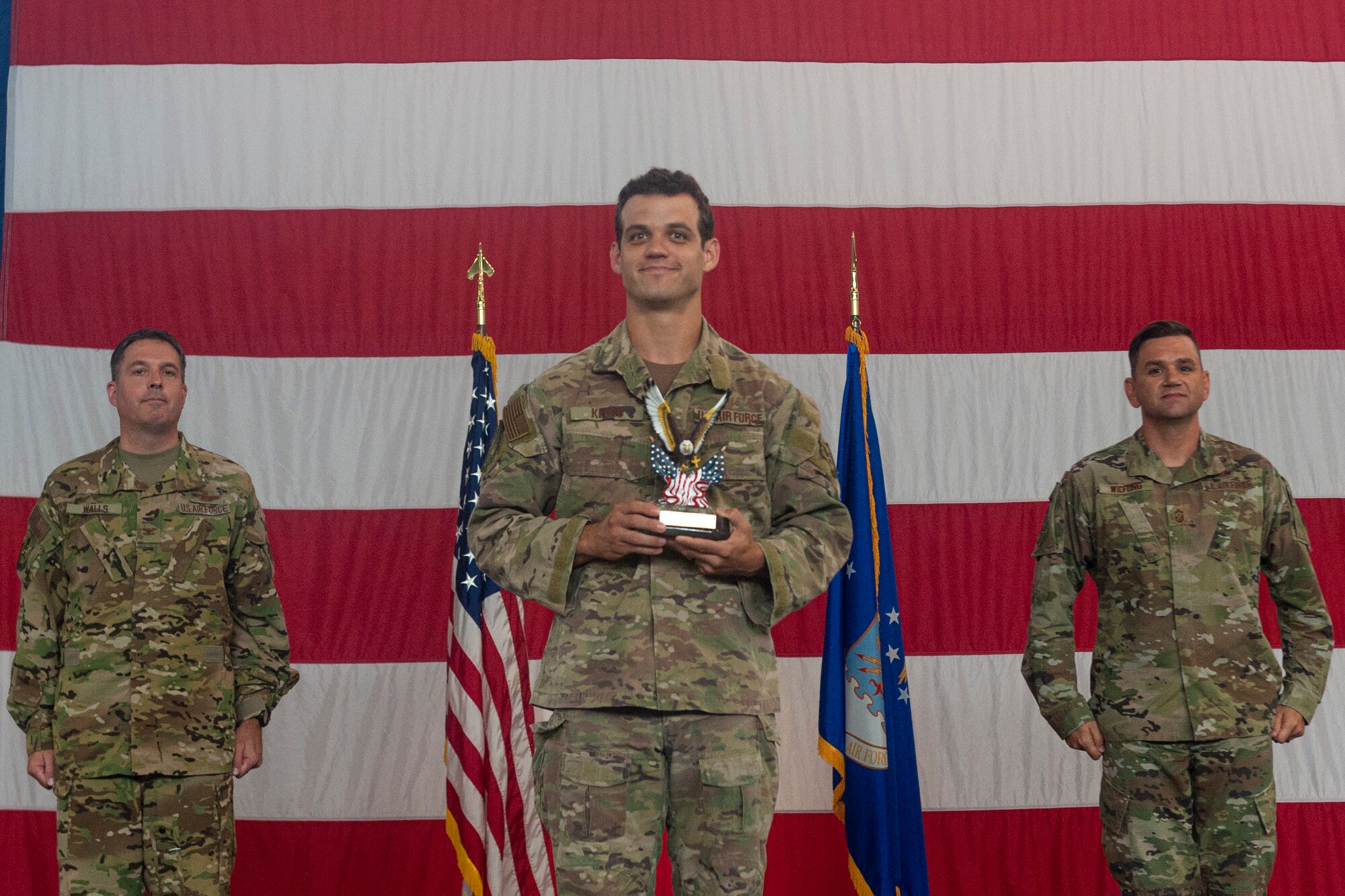 Photo of Airman receiving an award