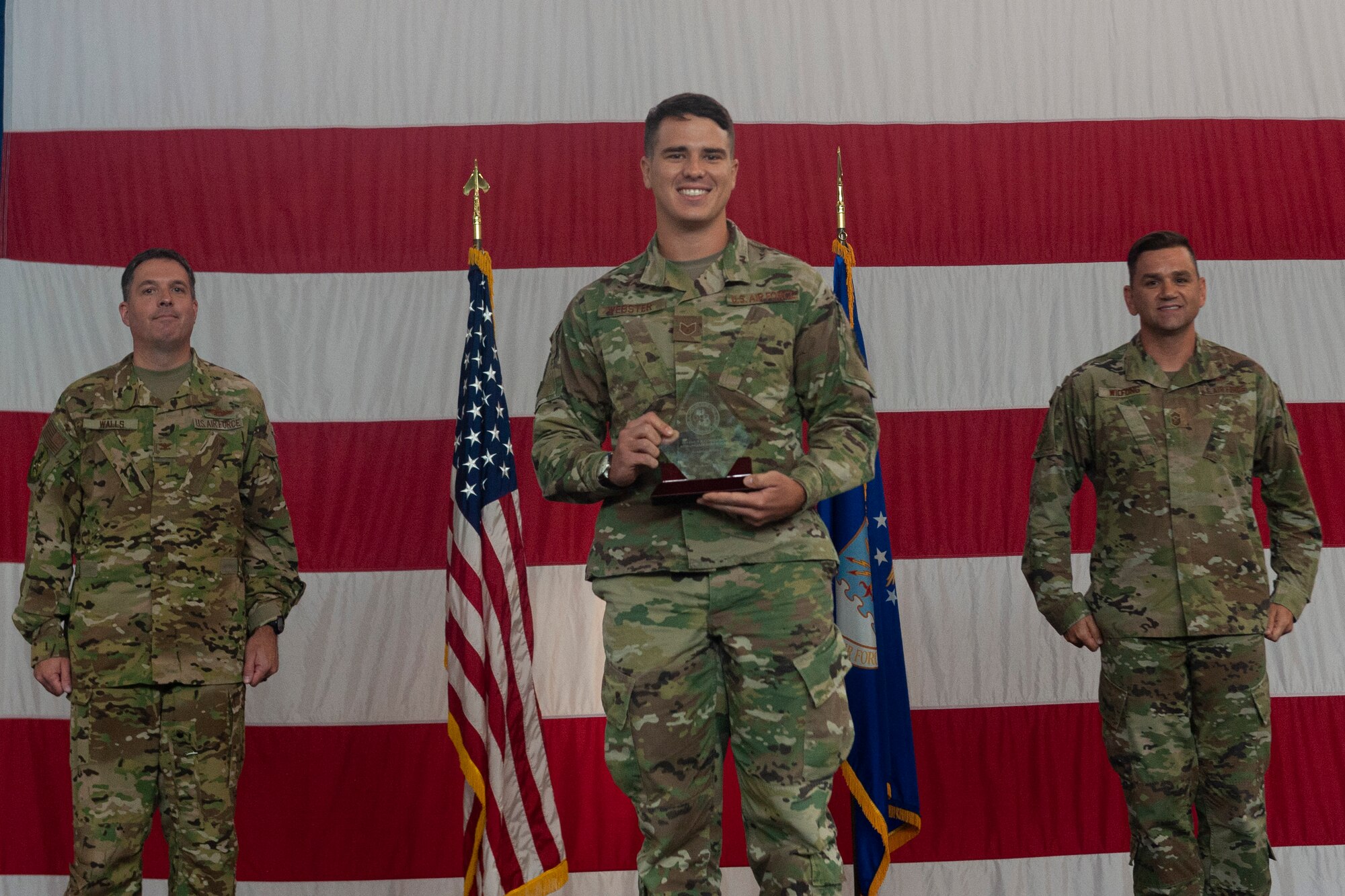 Photo of Airman receiving an award