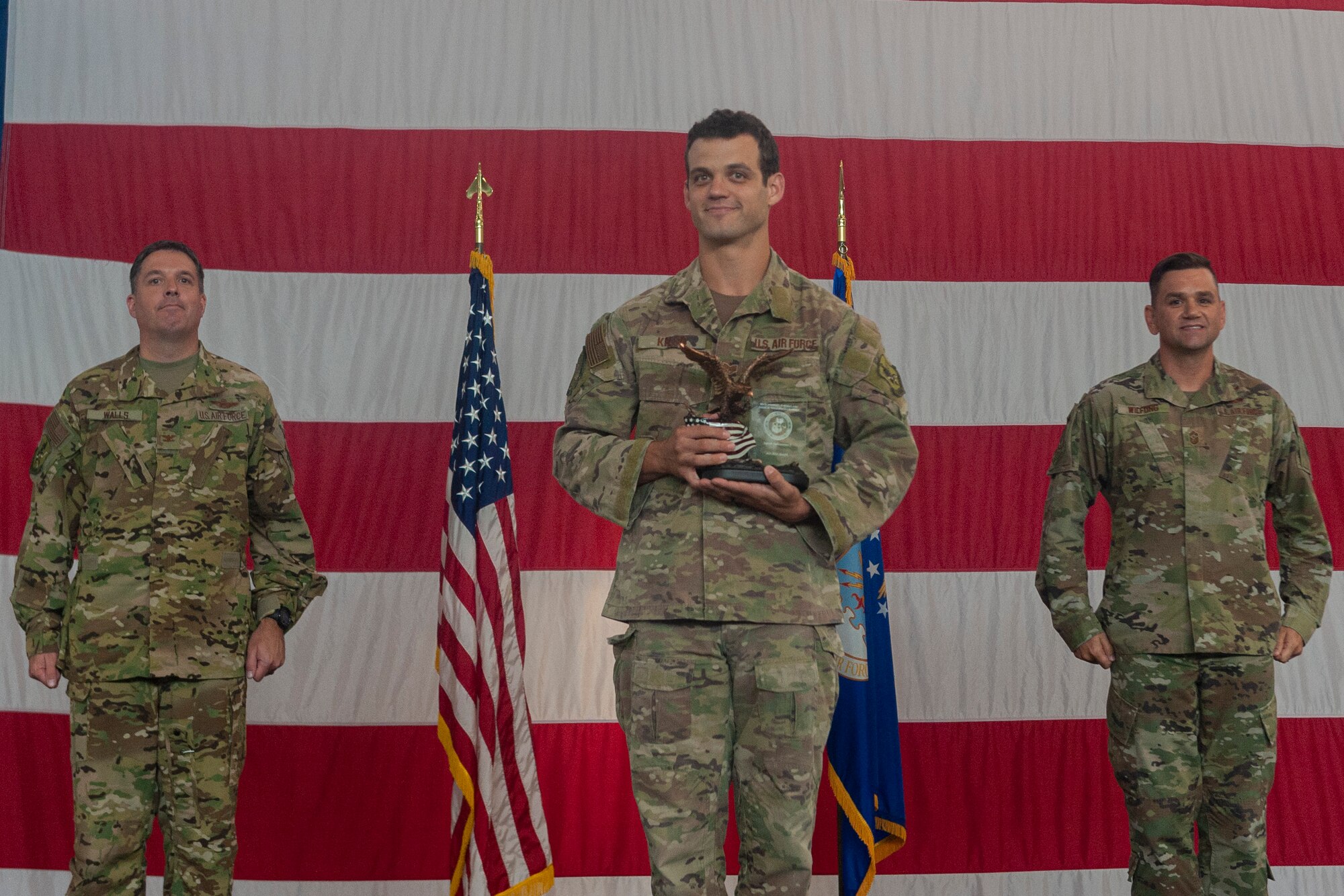 Photo of Airman receiving an award