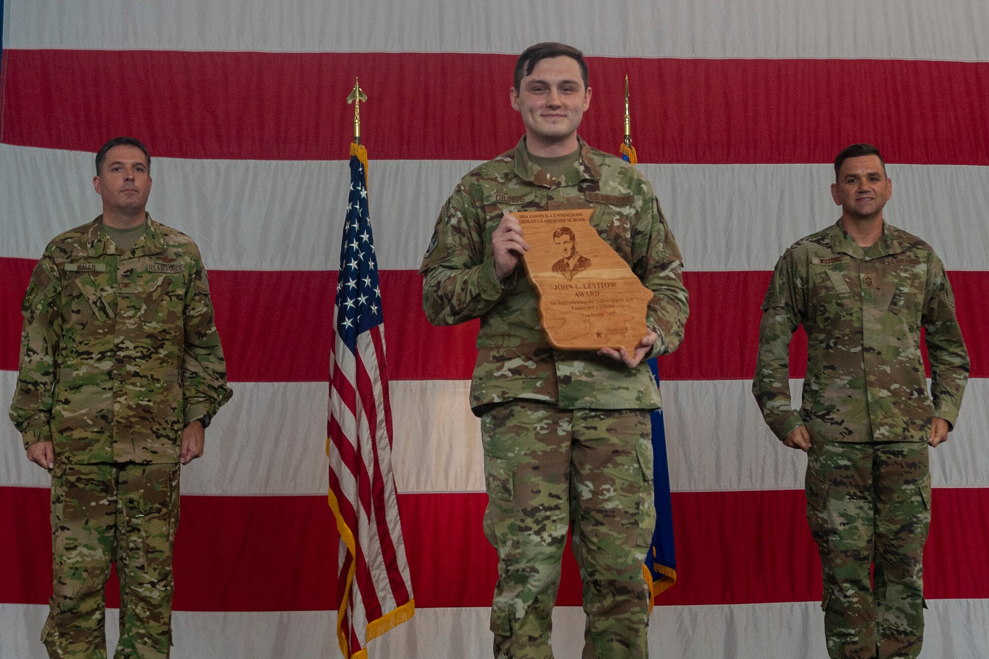 Photo of Airman receiving an award