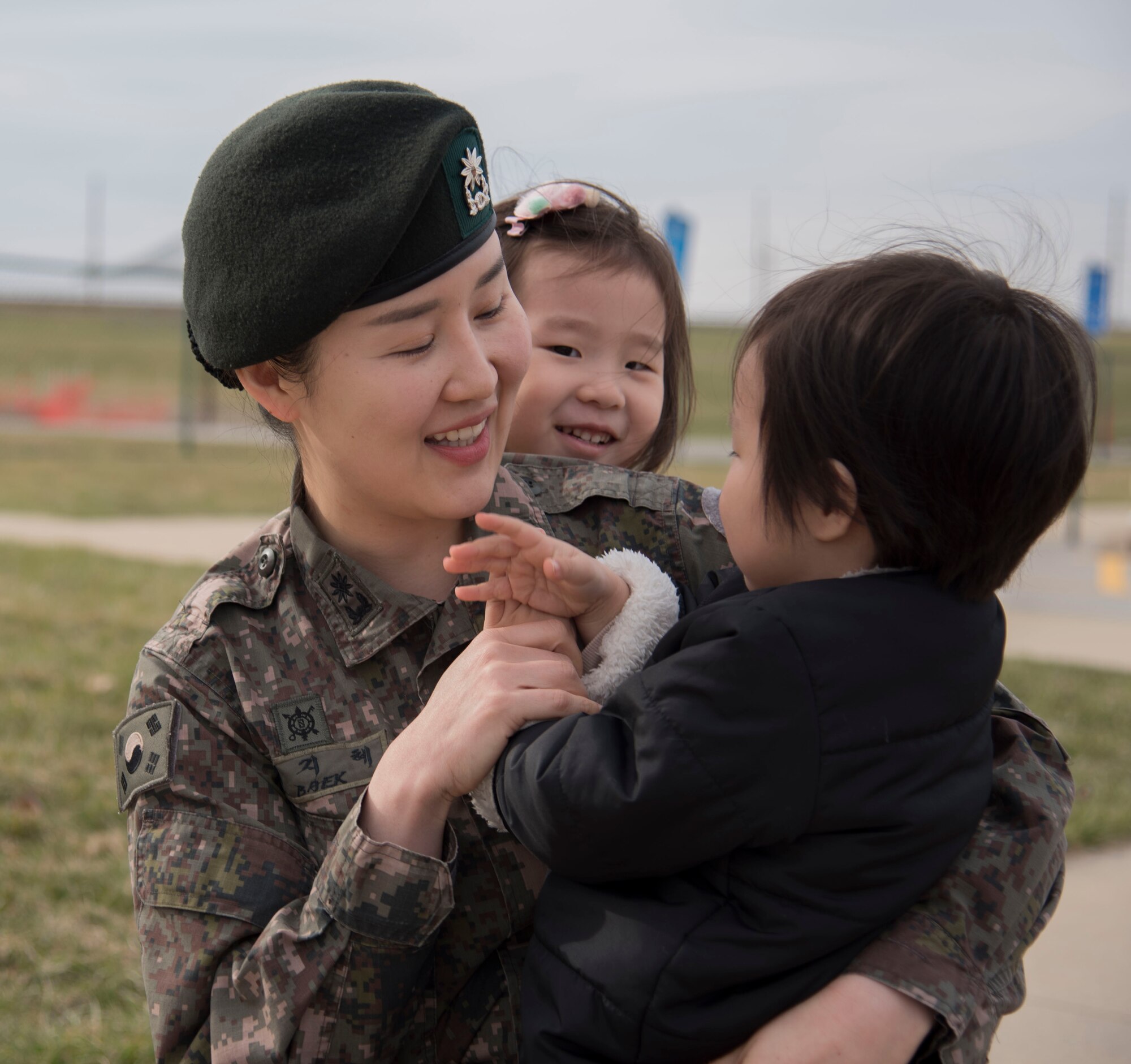 Maj. Paek with two of her children.