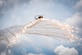 Airmen assigned to the 347th Rescue Group drop flares from an HH-60G Pave Hawk during a fini flight for Col. Bryan Creel, 347th RQG commander at Moody Air Force Base, Ga., June 5, 2020. The fini flight is a long-standing Air Force tradition that occurs when a pilot departs from an assigned unit. (U.S. Air Force photo by Senior Airman Hayden Legg)