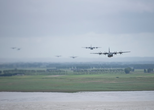 A C-130J Super Hercules flies through French airspace June 6, 2020. To commemorate the 76th anniversary of D-Day, eight C-130J aircraft from the 37th Airlift Squadron at Ramstein Air Base, Germany, performed low-level formations over several different locations in France. (U.S. Air Force photo by Staff Sgt. Kirsten Brandes)