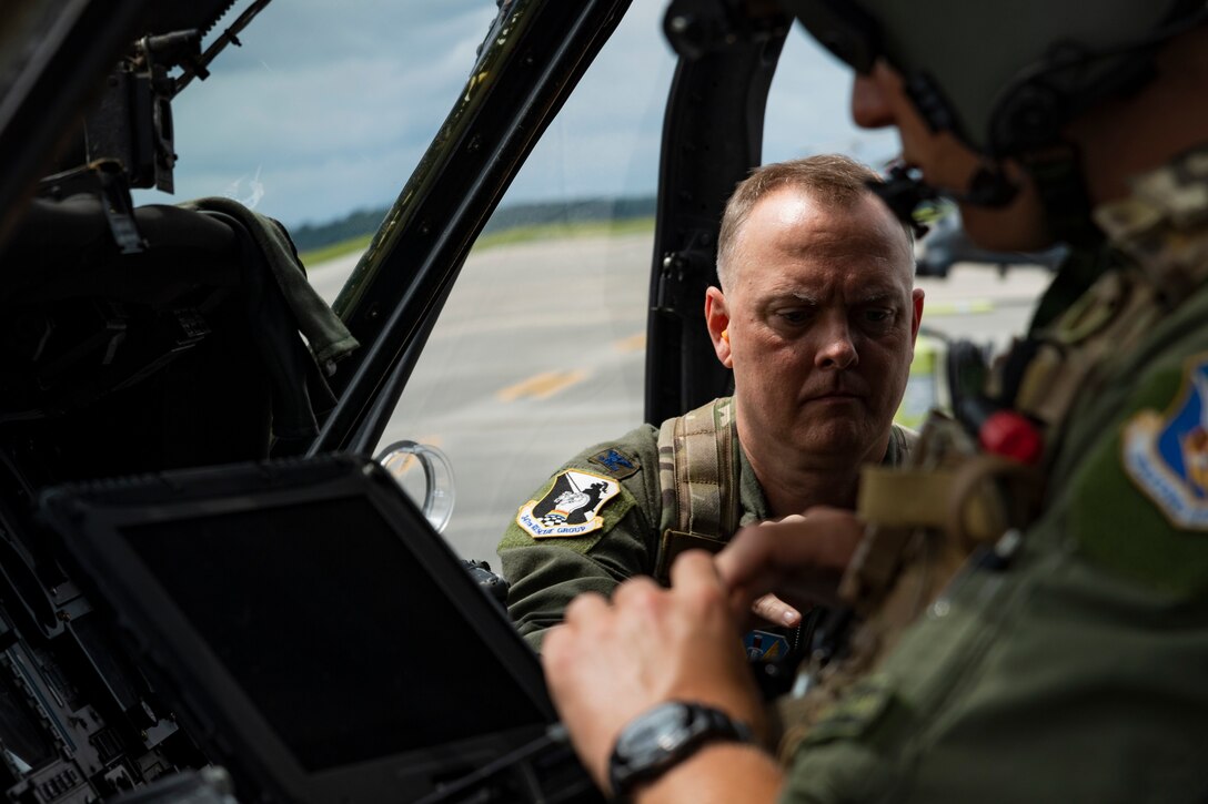 A photo of an Airman preparing for flight